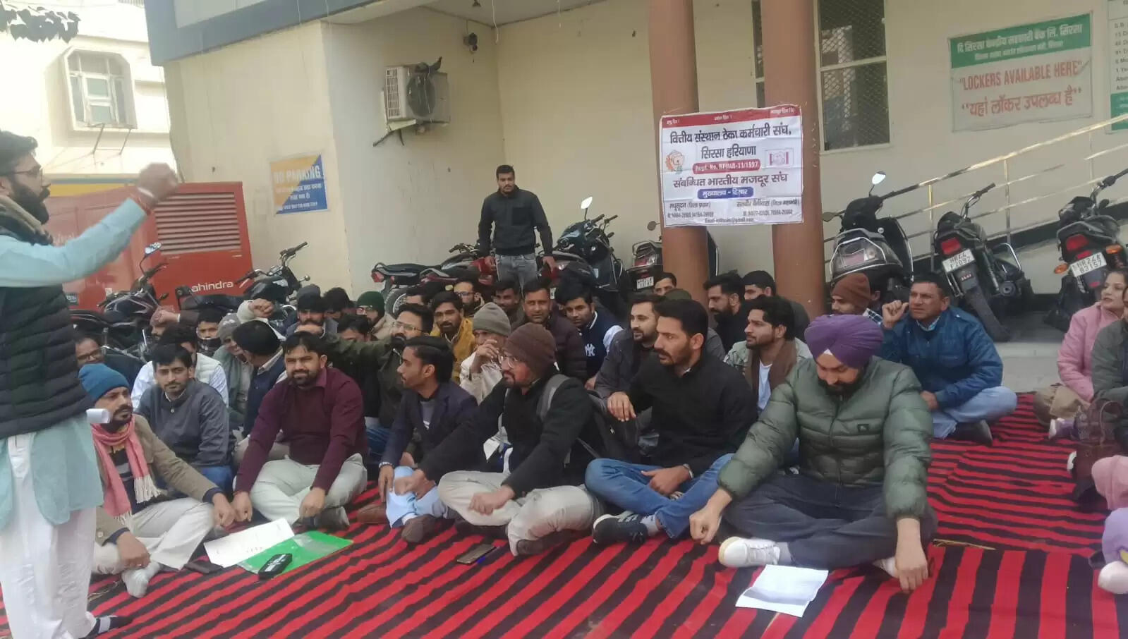 Contractual employees working in Sirsa District Central Cooperative Banks demonstrated and submitted a memorandum