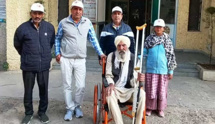 District Red Cross Society provides wheelchair to disabled elderly on International Day of Disabled