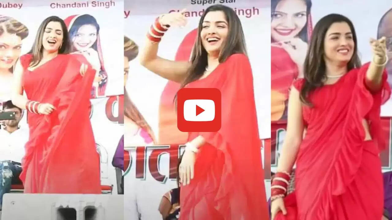 Amrapali Nirahua Dance: लाल साड़ी में आम्रपाली ने स्टेज पर ठुमके निरहुआ के साथ लगाए जबरदस्त ठुमके, भीड़ हुई बेकाबू...देखें