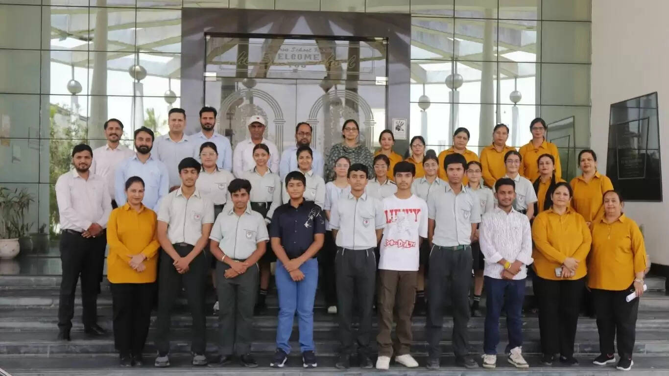 Topper students of class XII were honoured at The Sirsa School, Sirsa