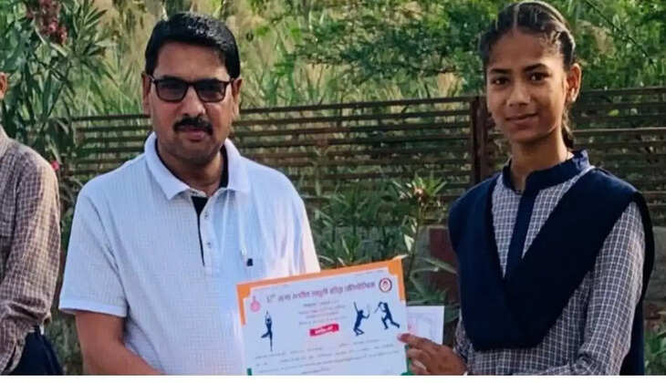 Nishu Kumari, a student of Nathusari Kalan Aarohi Model School, came first at the district level in Yoga Olympiad